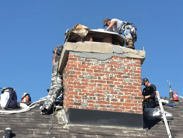 St. Cloud Chimney Sweep installing a custom chimney crown in St. Cloud, FL