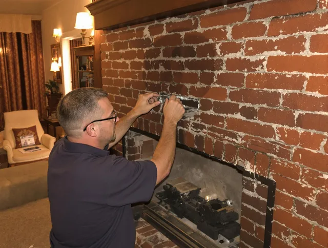 St. Cloud Chimney Sweep expert fixing a fireplace in St. Cloud, FL